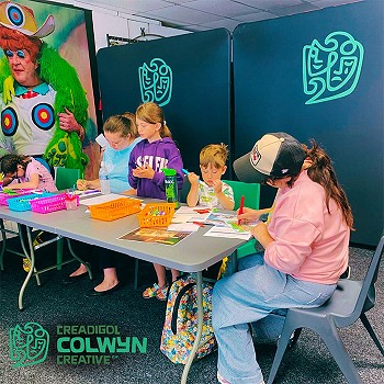 Children having fun colouring and drawing pictures